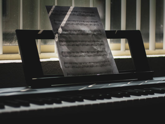 Sheet music on a keyboard