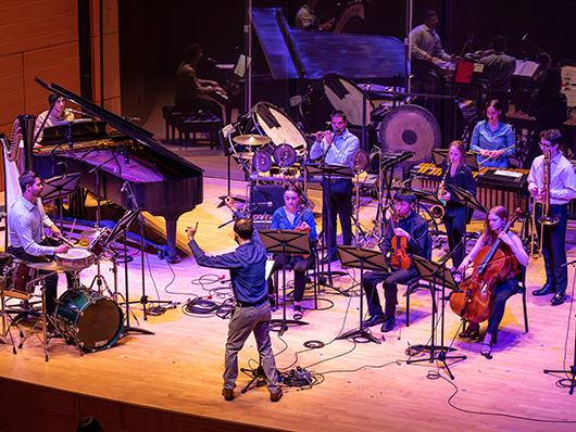 Contemporary music ensemble musicians onstage