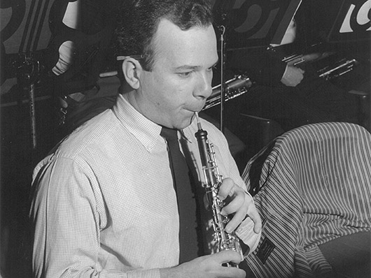 Musician Marc Lifschey playing the oboe