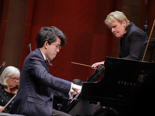 Aristo Sham at the piano.
