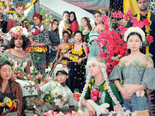 students wearing flowers