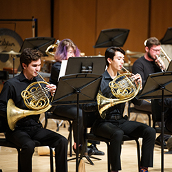 Performers with French horns
