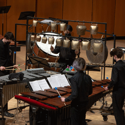 Percussion Ensemble performing on stage.