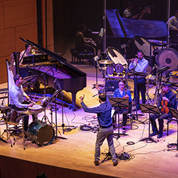 Contemporary music ensemble musicians onstage
