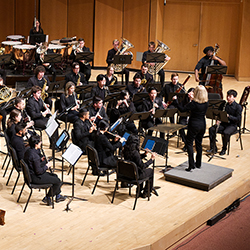 Symphonic wind musicians onstage