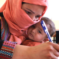 Afghan woman and baby
