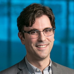 Marc Miskin, Asst. Prof. The GRASP Lab, University of Pennsylvania. Image of smiling man with glasses.