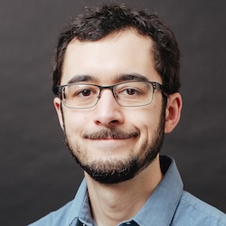 Philip Dames, Assoc. Professor with Temple University presenting at Northwestern Center for Robotics and Biosystems. Image of smiling man.