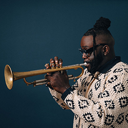 Marquis Hill plays the trumpet.