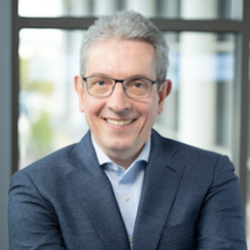 
								Prof. Wolfram Burgard, University of Nuremberg smiling.