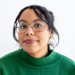 Woman in green sweater.