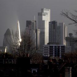 light reflects off of London skyline on overcast day